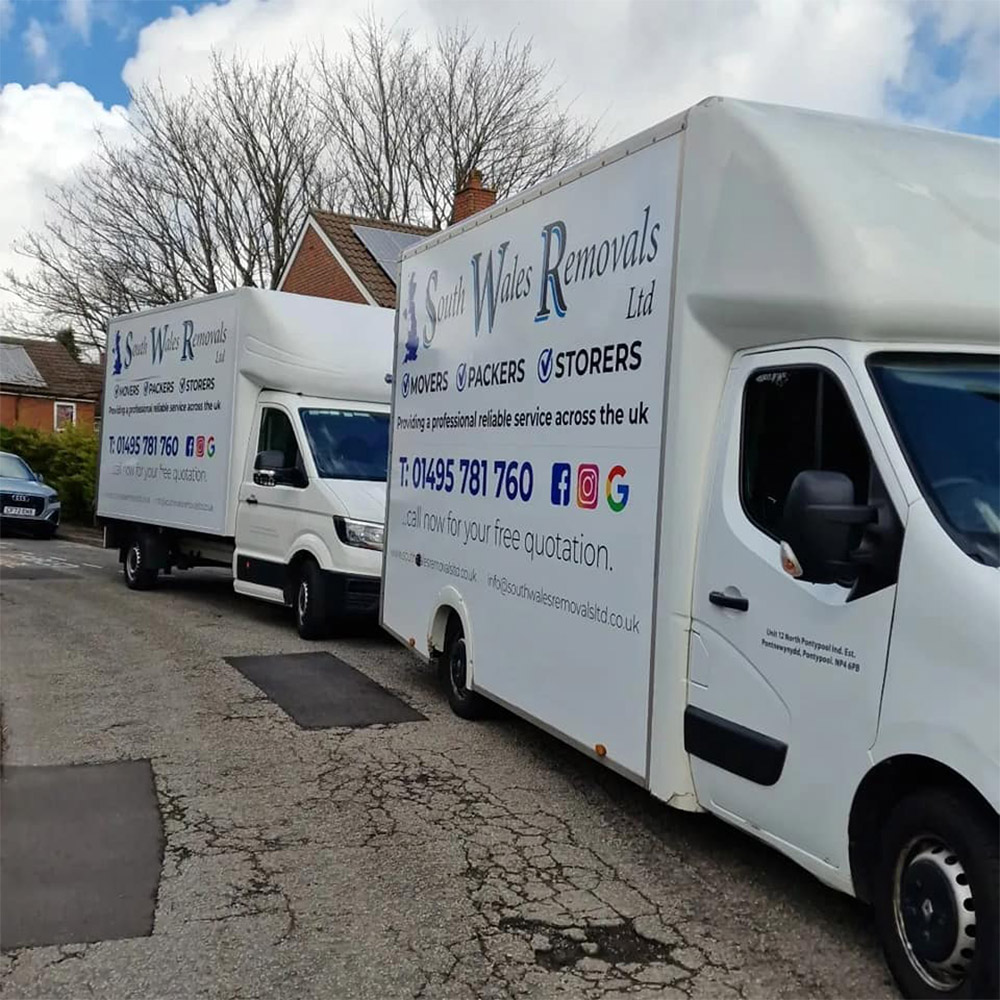 House removals in progress with removals vans parked